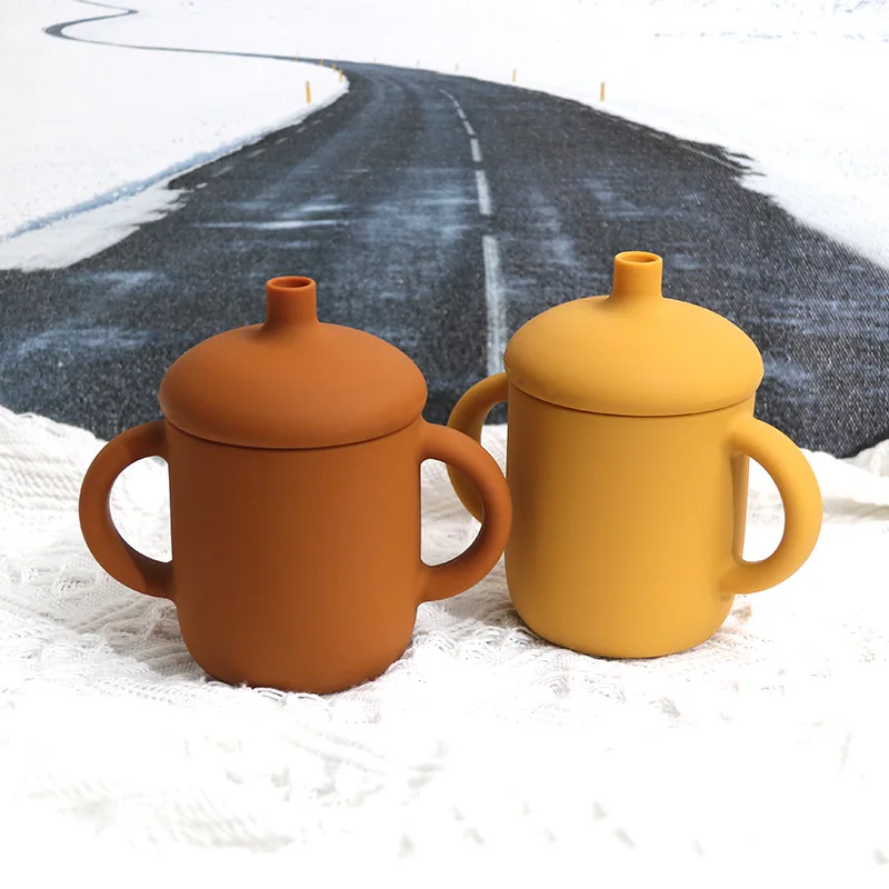 

Baby Feeding Cups Silicone Drinkware Cute Cartoon Cup For Toddlers Kids Sippy Cup Lids Solid With Handle Drinker 6 Colors