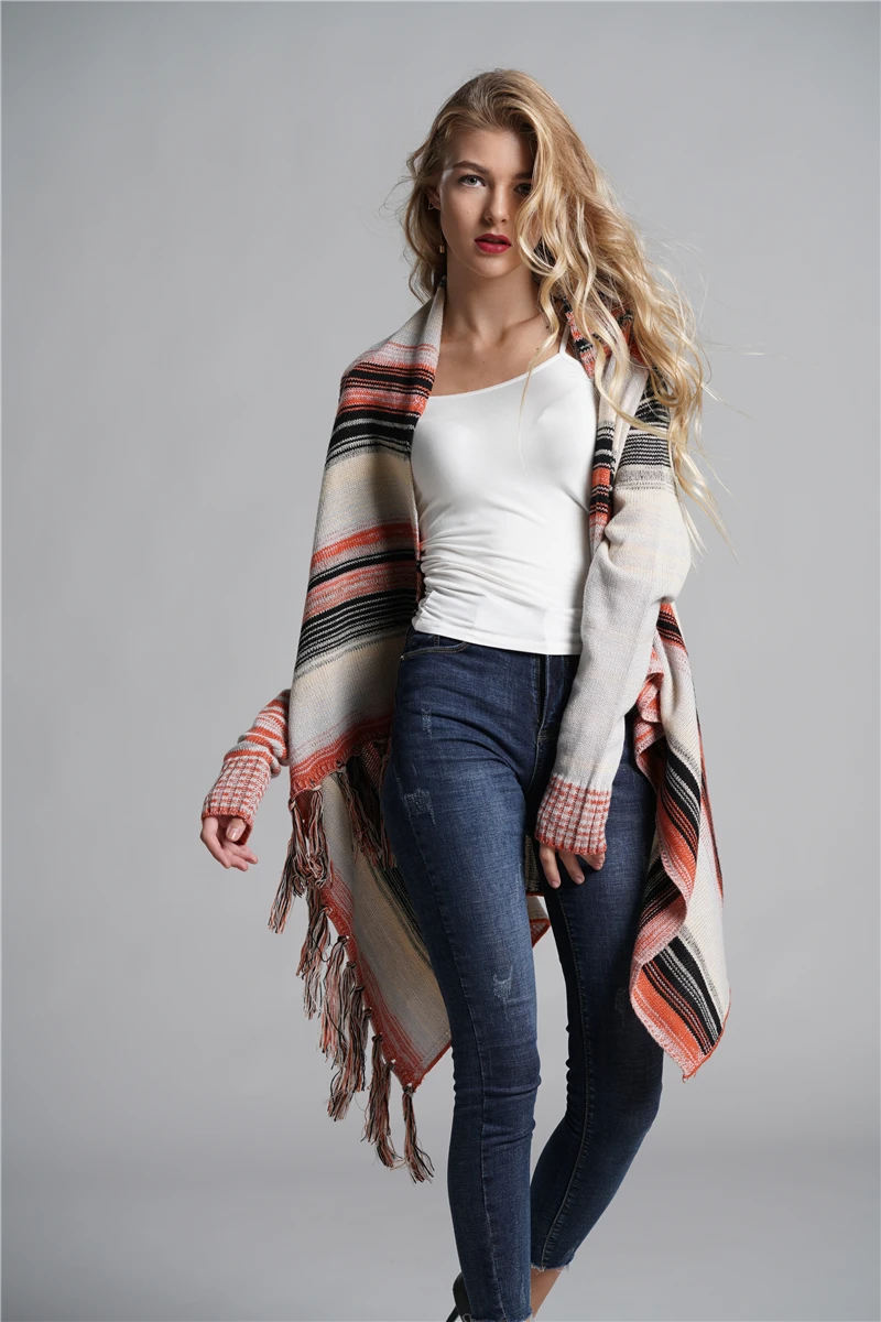 

Autumn and winter new knit cardigan striped long-sleeved tassel long loose sweater women open stitch