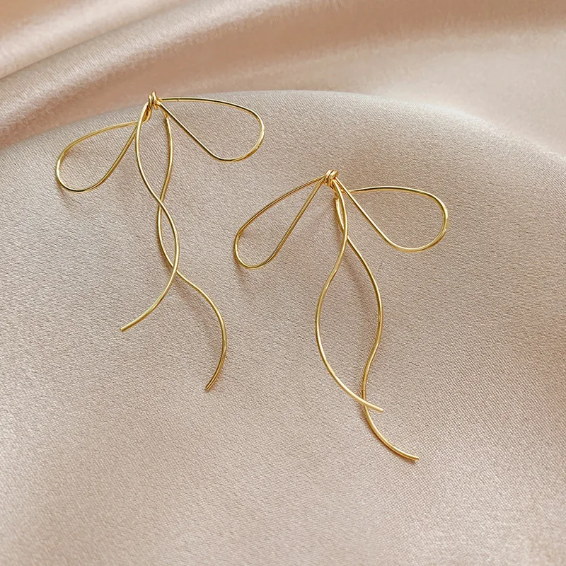 Дизайнерские висячие серьги с бантом и кисточками из серебра 925 пробы элегантные