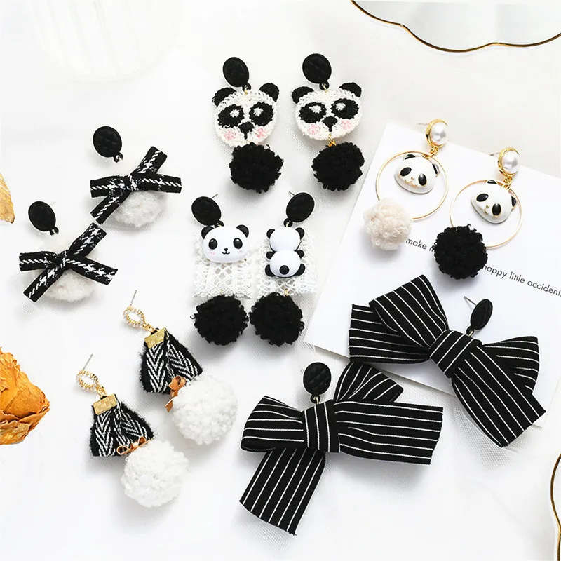 

2021 New Cute Black Fur Ball Pendent Earrings Cartoon Panda Bow Long Dangler Korean Asymmetry Autumn and winter Drop Earrings