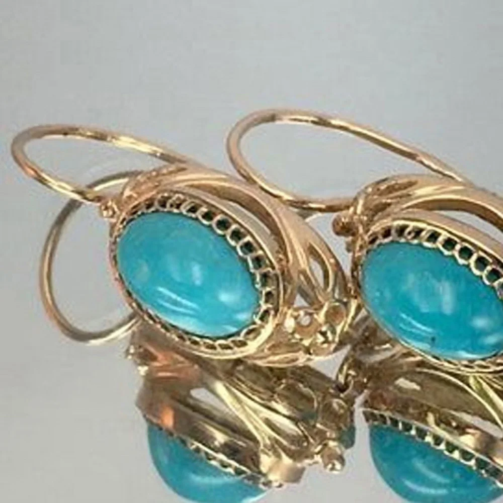 

Винтажные женские серьги-подвески золотого цвета с зелеными изумрудами