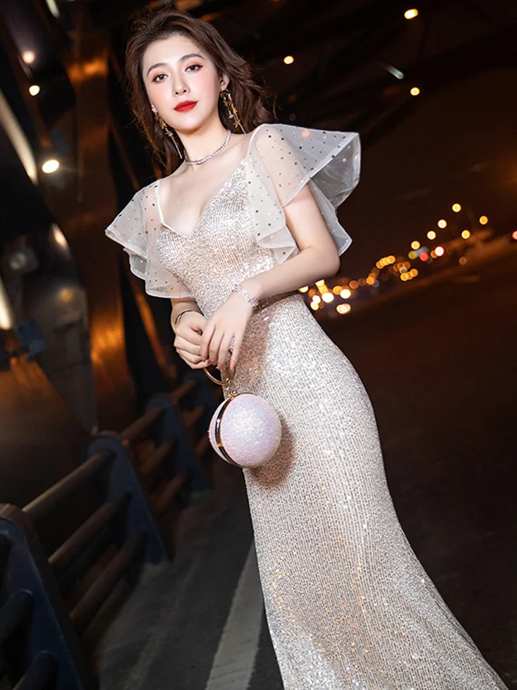 

Платье женское вечернее стрейчевое с V-образным вырезом, блестками, оборками и короткими рукавами