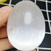 high quality natural white selenite egg stone polished gypsum crystal egg stone gemstone healing raw gypsum stone massager 50mm