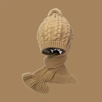 autumn winter ear protection hat womens warm knitting tassel baotou girl outdoor leisure solid color lace up beige
