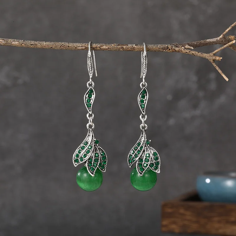 Винтажные серьги в виде кошачий глаз с инкрустированными бриллиантами и