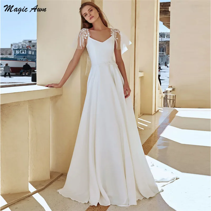 

Magic Awn Modest Satin Wedding Dresses 2021 V-Neck Lace Appliques Boho A-Line Bridal Gowns Cap Sleeves Illusion Abito Da Sposa