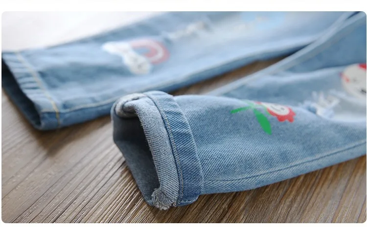 Зимние штаны для маленьких девочек джинсовые плотные с мультяшным рисунком