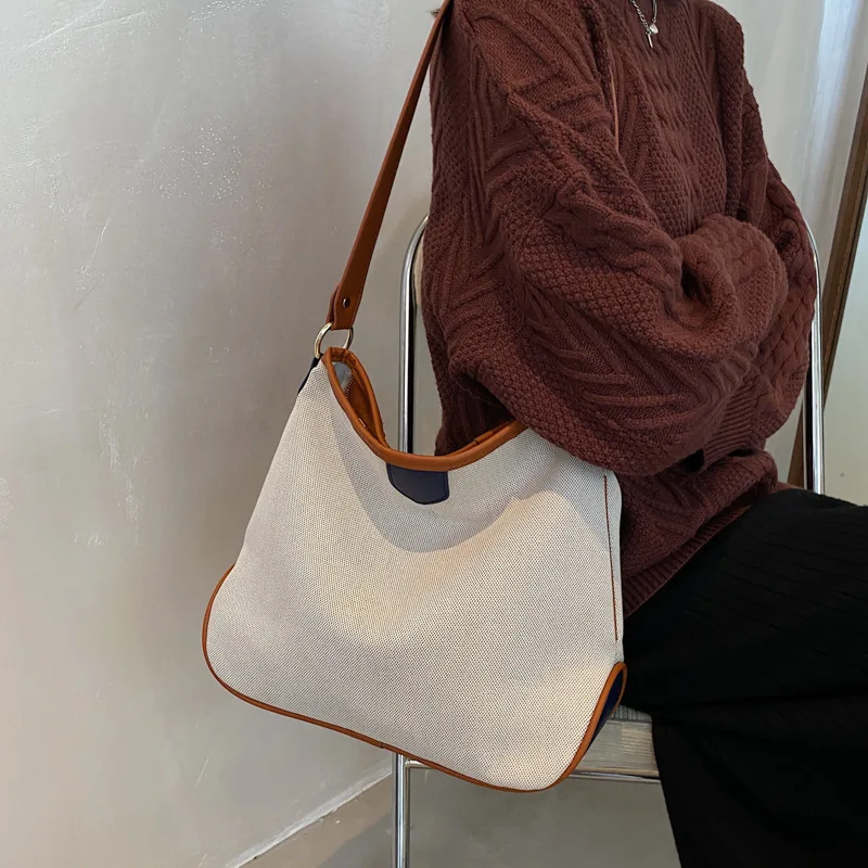 

Niche dign bag 2021 new fashion women's autumn Canvas Msenger Bag single shoulder armpit small square bag