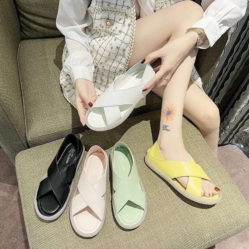 

Soft leather sandals female 2021 spring new leisure hundred comfortable flat soft bottom student two wear sandals