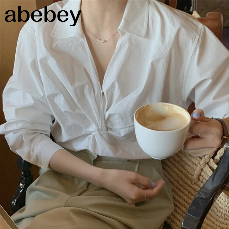 

Новая весенняя темпераментная универсальная рубашка с отложным воротником и длинными рукавами Свободная однотонная Повседневная рубашка ...