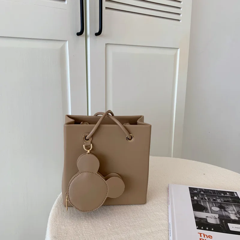 

Disney cartoon Mickey 2021 spring and summer new solid color pu ladies fashion all-match one-shoulder portable messenger bag