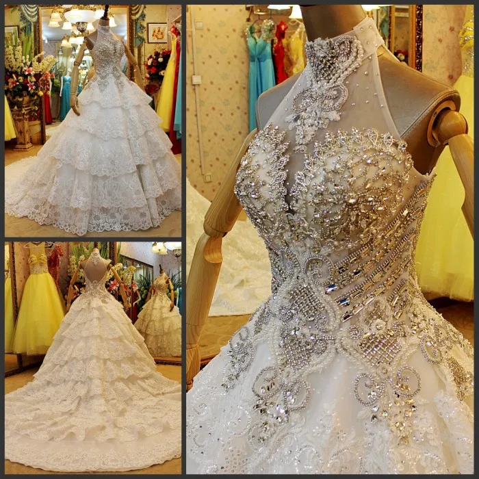 

Ball Gown Wedding Dresses Princess 2021 Sleeveless Illusion Back Crystal Beading Lace Tulle Tiered Skirt Bridal Wedding Gowns