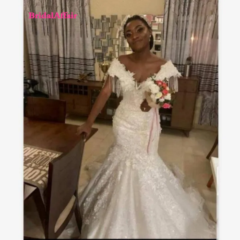 

African Mermaid Wedding Dresses With Tassels Sequins Appliques Lace Wedding Dress Capped V Neck vestido de novia
