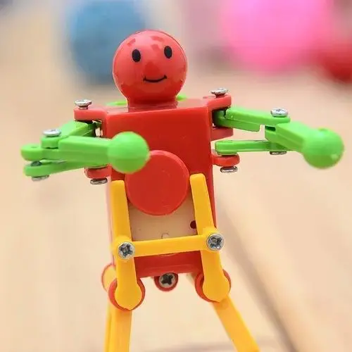 Новый продукт - креативная заводная игрушка-робот, танцующая и крутящаяся, детские образовательные игрушки горячего вечернего рынка.