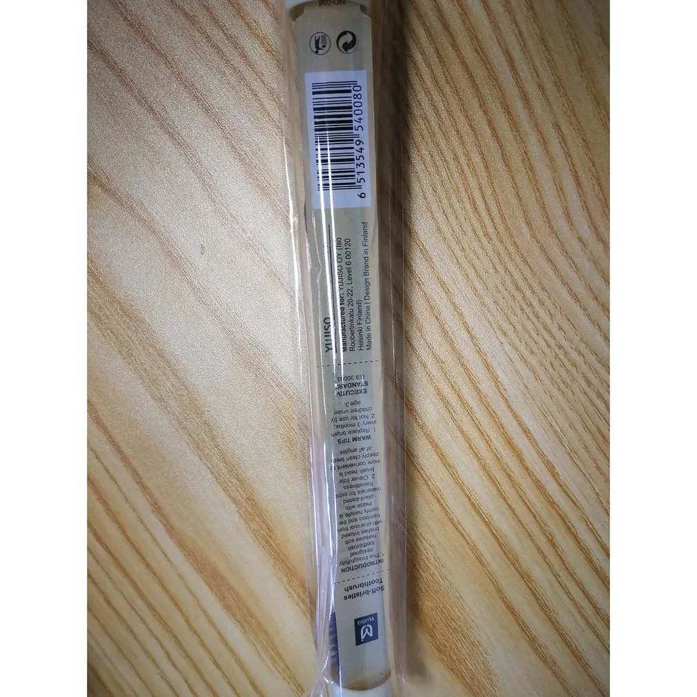 

Long charcoal soft toothbrush
