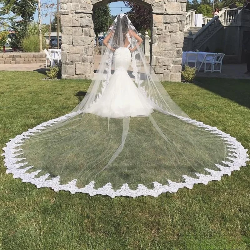 

Фата свадебная длинная Однослойная с кружевной отделкой и аппликацией