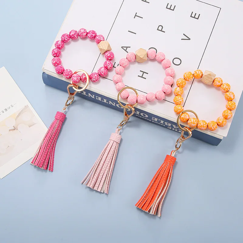 

bracelet femme Wood Grain Silicone Tassel Keychain Unisex Multicolor Beads PU Leather Accessories Wholesale Wrist Strap Keychain