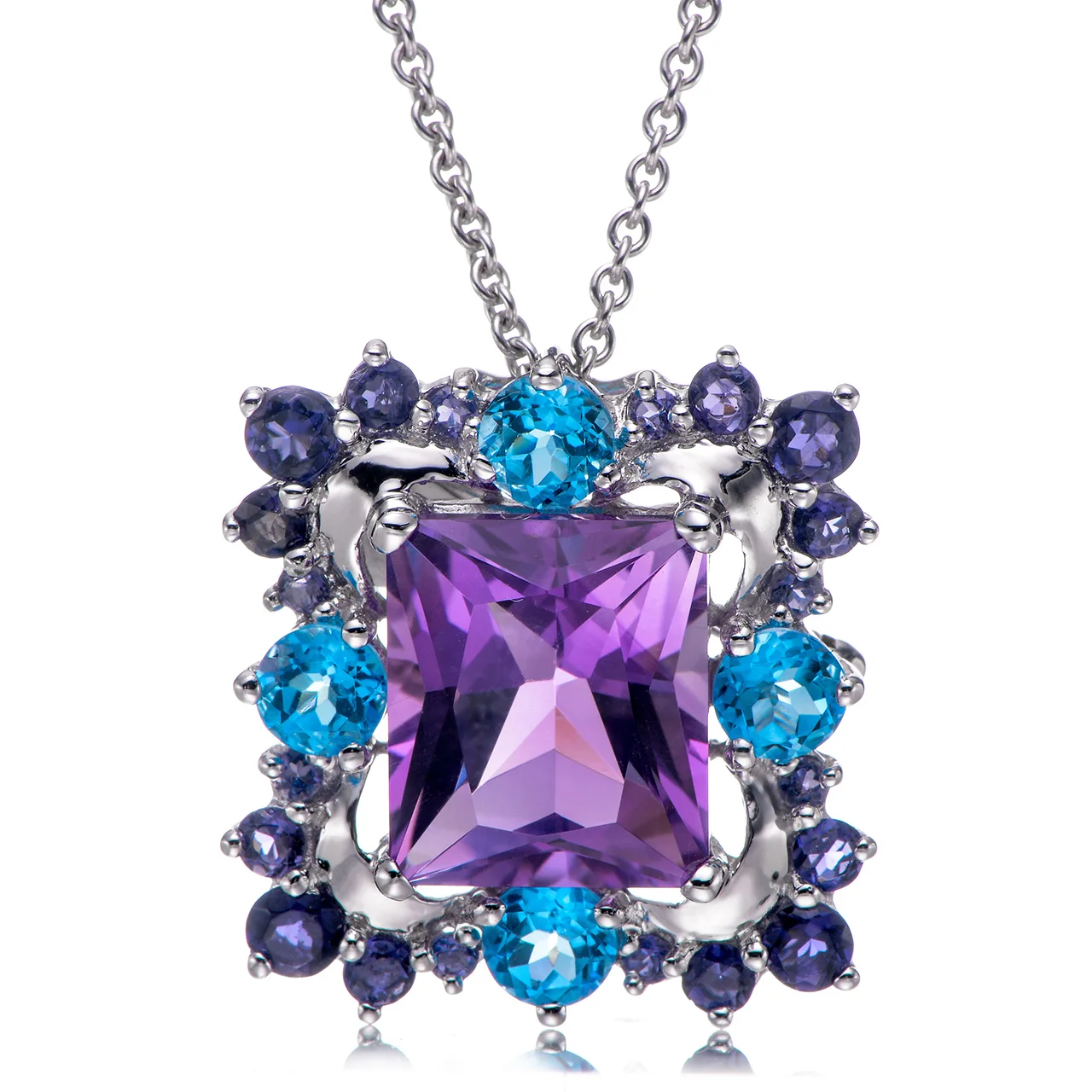 

Подвеска из серебра 925 пробы с аметистом и голубым топазом и иолита