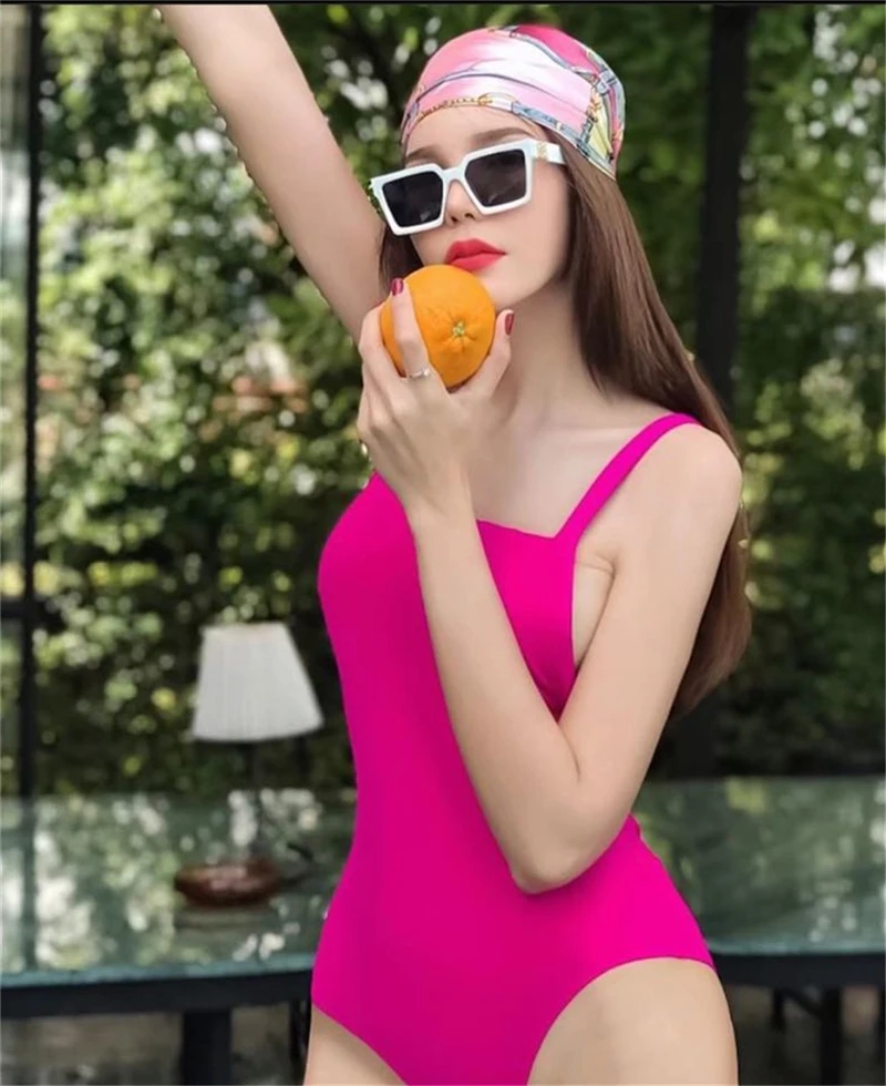 

Женский слитный купальник разных цветов, новинка, монокини на бретелях в Корейском стиле, летняя пляжная одежда с открытой спиной, купальны...