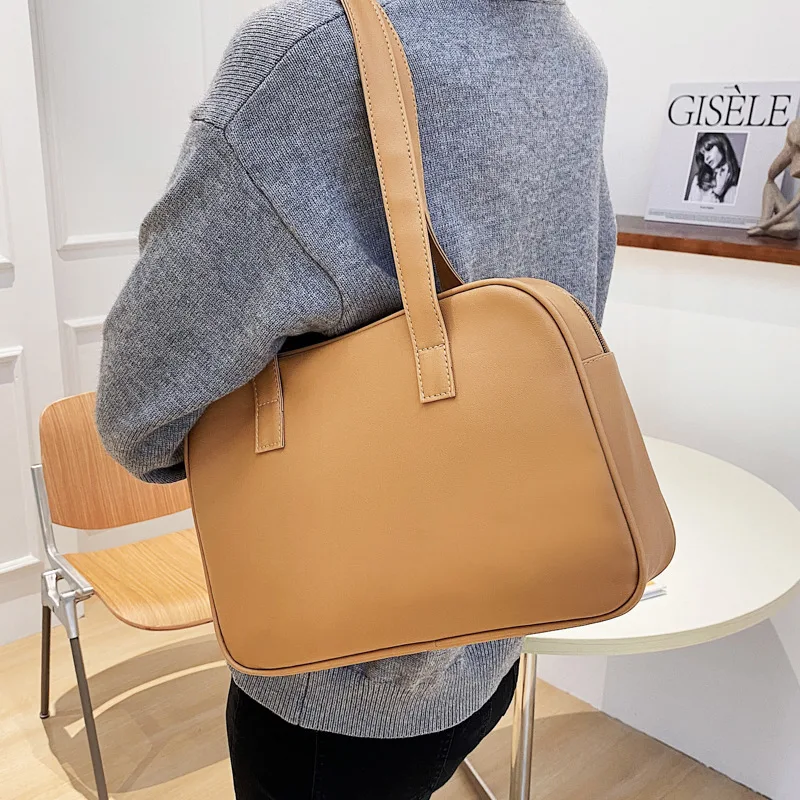 

Вместительная сумка на одно плечо для женщин, новинка 2021, модная Простая Сумка-тоут, однотонная Повседневная Студенческая сумка в студенчес...