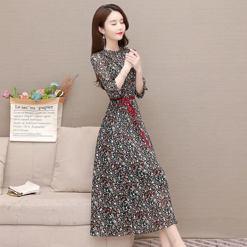 

Dress spring and autumn women's dress 2021 new waist show thin temperament medium length fashion foreign style floral skirt