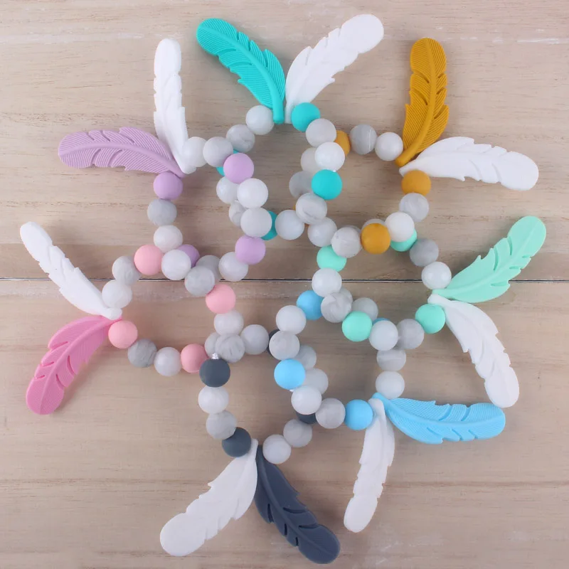 

2019 Hot Sale DIY Baby Food Grade Silicone Molar Feather Bracelet Toy Nontoxic Beads Silicone Pacifier Chain