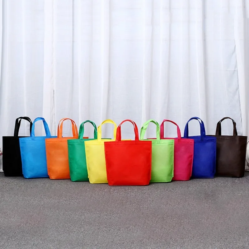 

1Pcs Folding Storage Bag Nonwoven Reusable Women Fashion Shopping Bags Traveling Tote Clothes Food Home Organizers