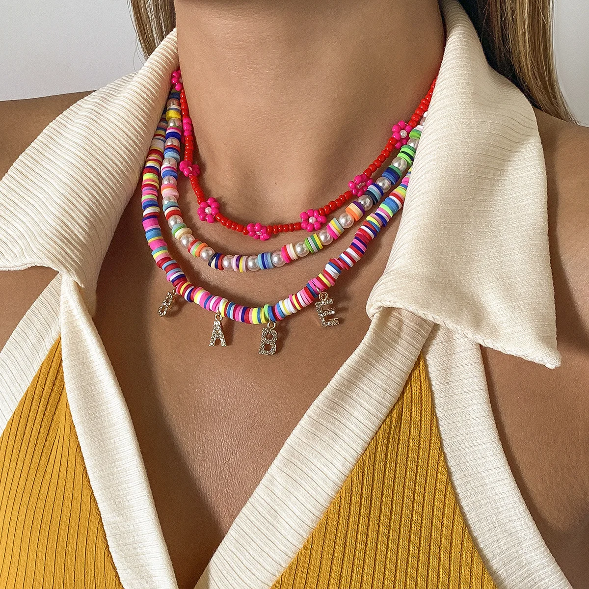 

Bohemian Ethnic Soft Pottery White Imitation Pearl Red Millet Beads BABE Letter Necklace Women's Neck Ornament Jewelry Accessory