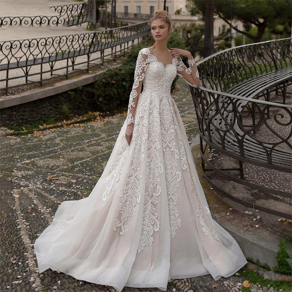 

Осеннее свадебное платье принцессы трапециевидной формы с глубоким круглым вырезом и аппликациями с длинными рукавами иллюзионные тюлевы...