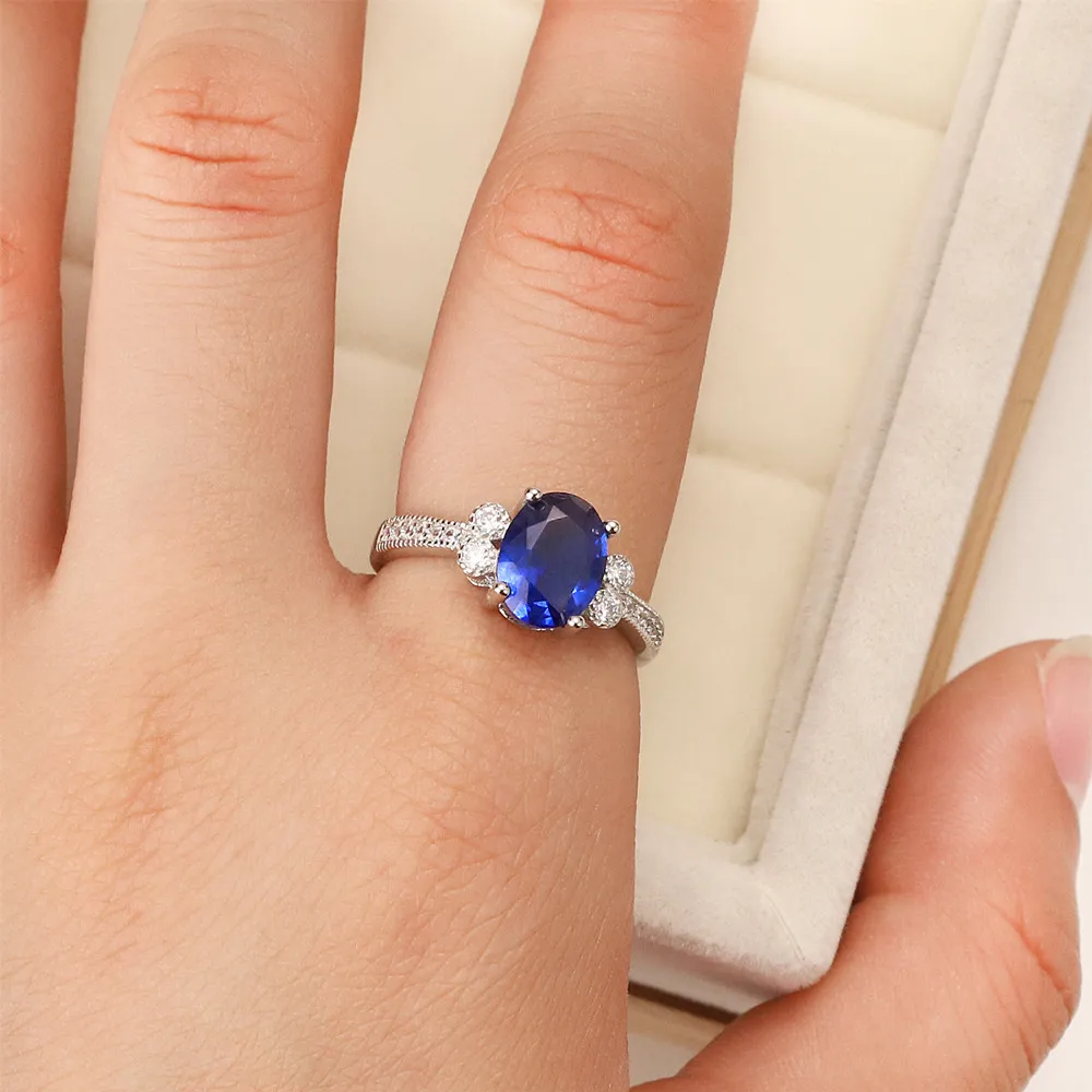 

Best selling European and American fashion S925 silver wedding ring zircon lady blue goose egg crystal jewelry gift