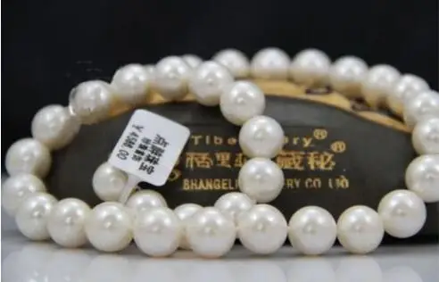 

Очаровательное ожерелье из натурального белого жемчуга AAA 18 "11-13 мм