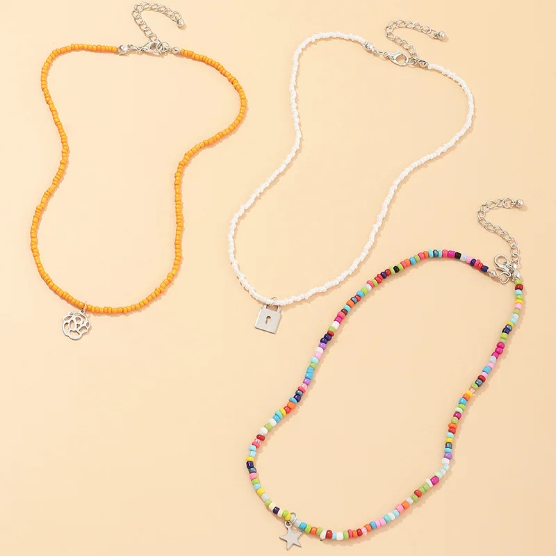

Ready to ShipIn Stock Fast Dispatch Bohemian Multi Layers Colored Beaded Chain Clavicle Necklace Star Hollow Floral Lock Pendant
