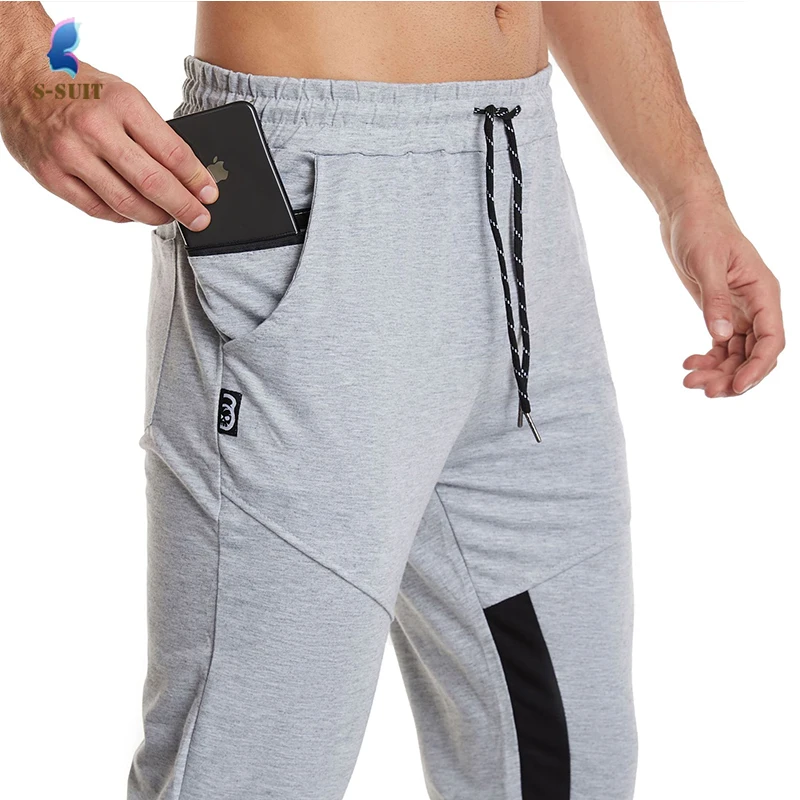 

2021 Large Size Men's Casual Solid Color Sports Pants European And American Fashion Running Fitness Pants Mobile Phone Pants