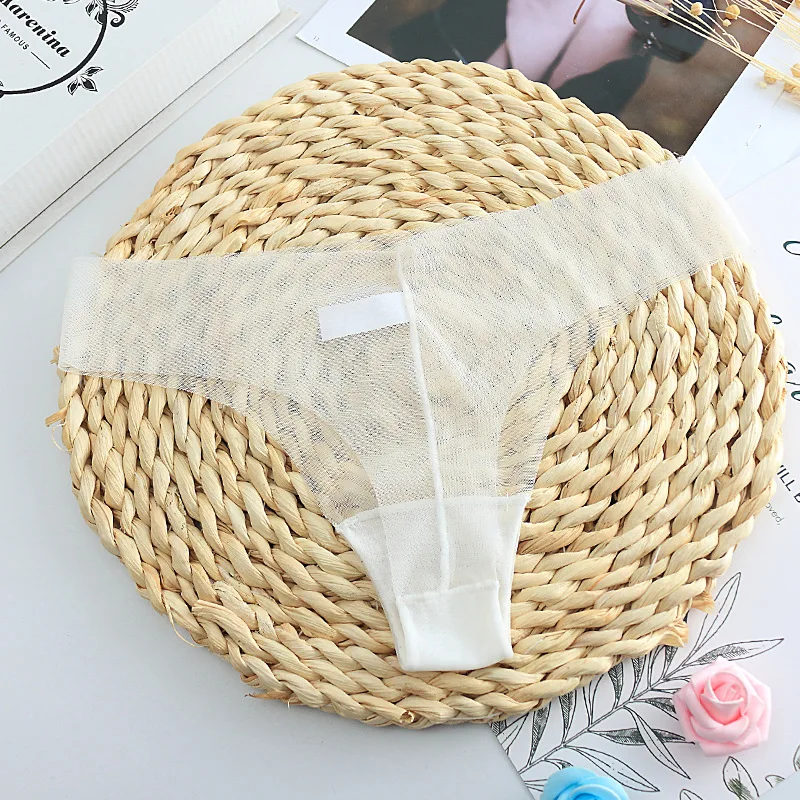 Прозрачные женские трусики стринги из сетчатого материала размера плюс близко