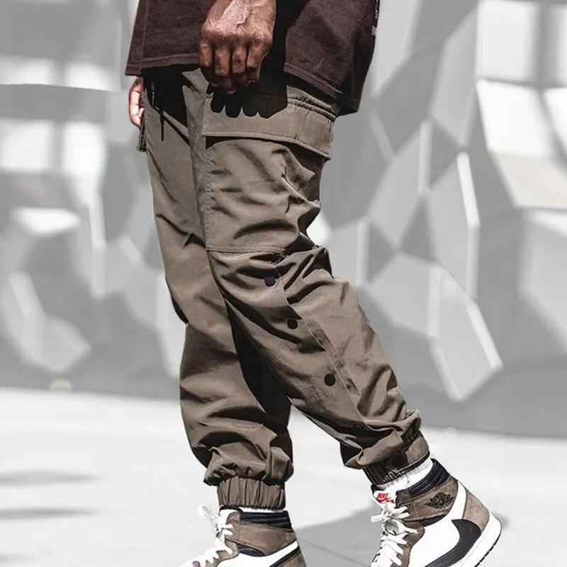 

2021 Hip Hop Streetwear Men Dry quickly Trousers Fashion Solid color Multi Pockets Sports Long Cargo Pants Work Trousers