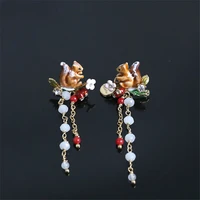 korean version of the niche creative enamel color glaze animal squirrel flower white bead tassel long face thin stud earrings