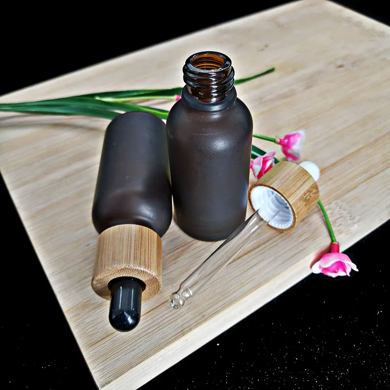 

50pcs 30mlAmber Frosted Glass Dropper Bottle With Bamboo Cap wood Grain Lid Cosmetic Pipette Essential Oil Packaging Container