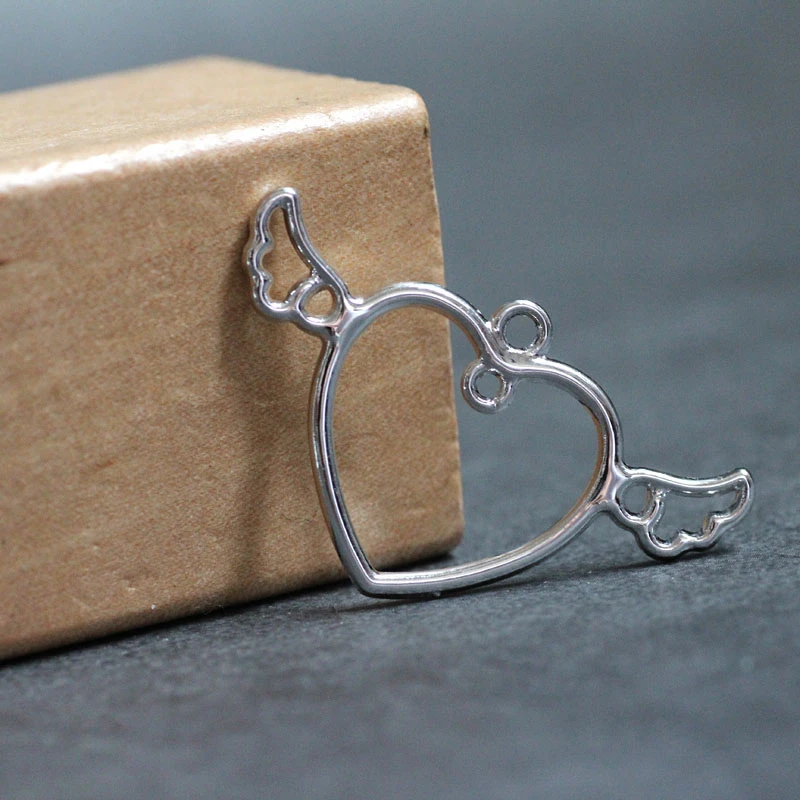 10cs Новый дизайн сплав Геометрическая личность лицо Крылья Любовь серьги для