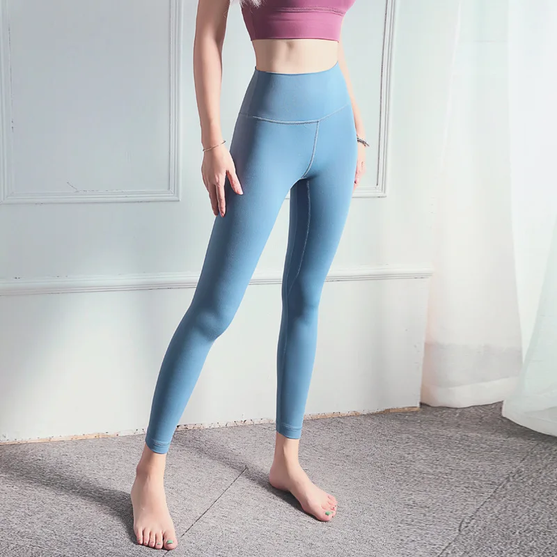 

Yoga pants The new Close skin Naked feeling fashion Tall waist abdomen Carry buttock peach hip fitness movement pants