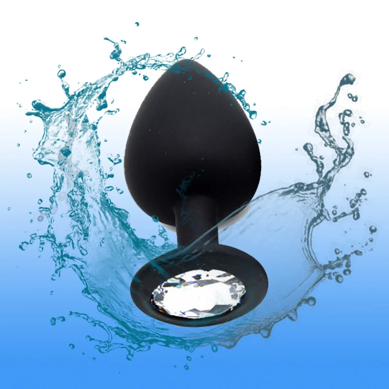 Силиконовые анальные пробки и вибратор фаллоимитатор с украшением в виде