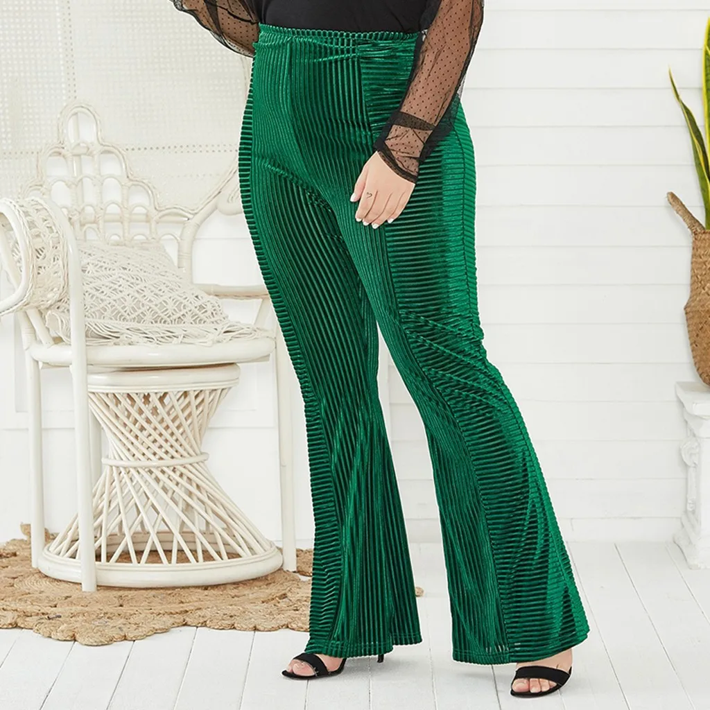 Зеленые винтажные расклешенные брюки женские осенне зимние размера плюс