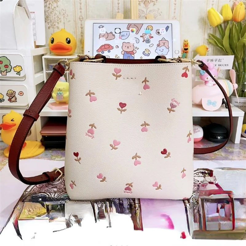 

2021 new printing bucket bag love flower one shoulder diagonal bag women's portable luxury women's bag women's bag