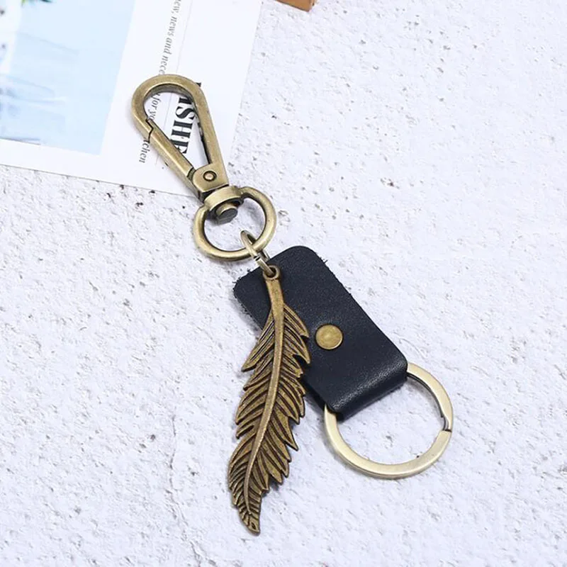 Крючки для сумок изящные подвески в виде листьев и перьев брелки мужчин модные