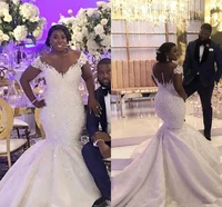 2020 new african plus size mermaid wedding dresses off shoulder lace appliques beaded sheer button back court train bridal gowns