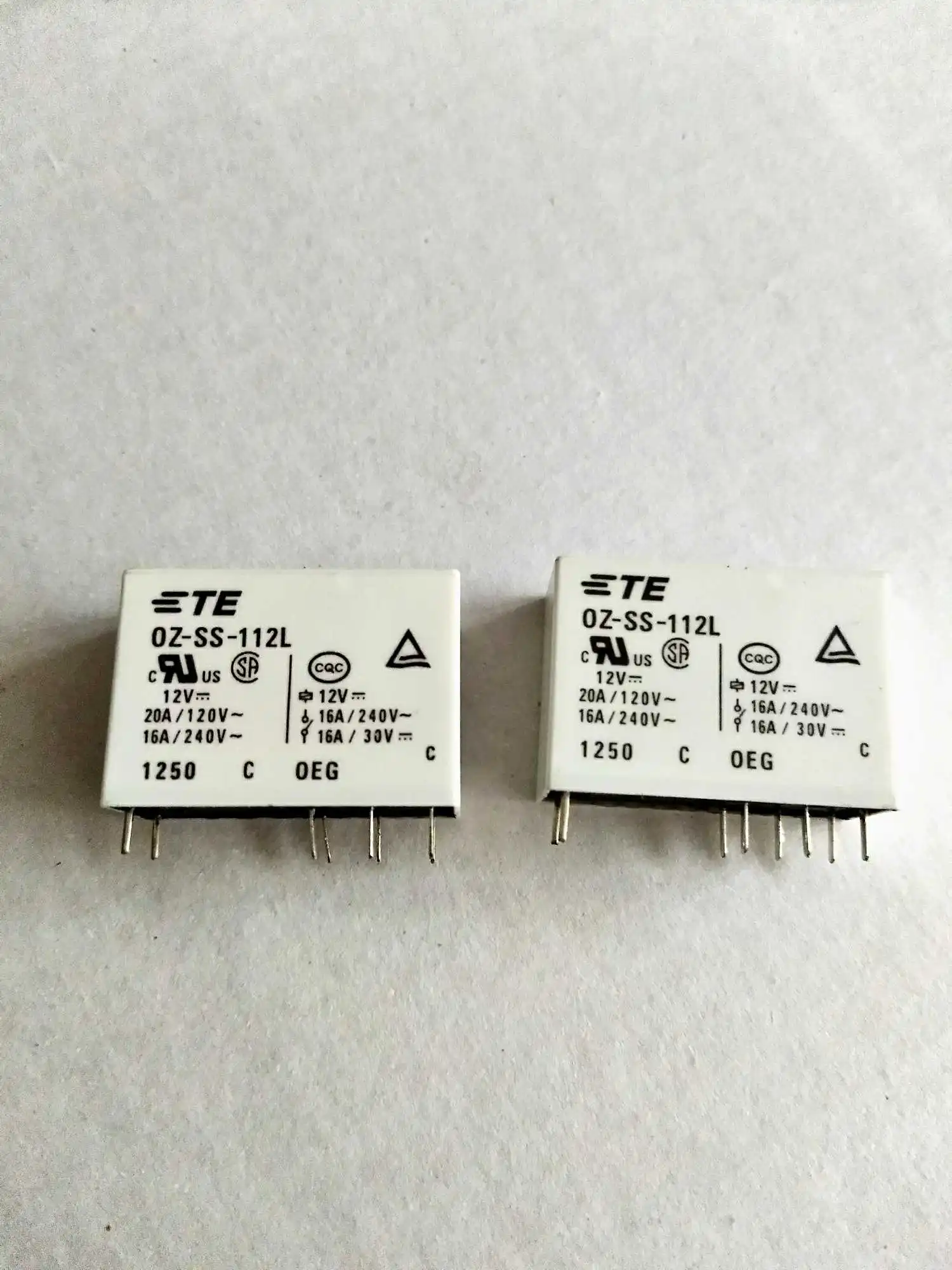 

IN STOCK 12V relay OZ-SS-112L OZ-SS-112L-12VDC OZSS112L 12V DC12V 12VDC 16A 240VAC DIP8