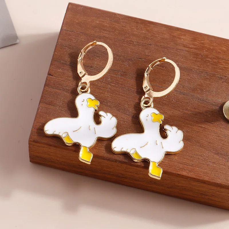 

Ornament Dripping Oil Metal Cute Little Duck Cheering Duck Pendant Earrings Earrings Wholesale