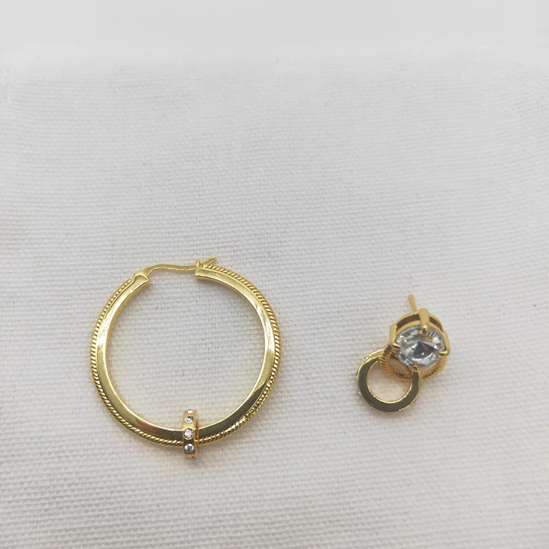 

Creative exaggerated large hoop earrings full of diamonds asymmetrical