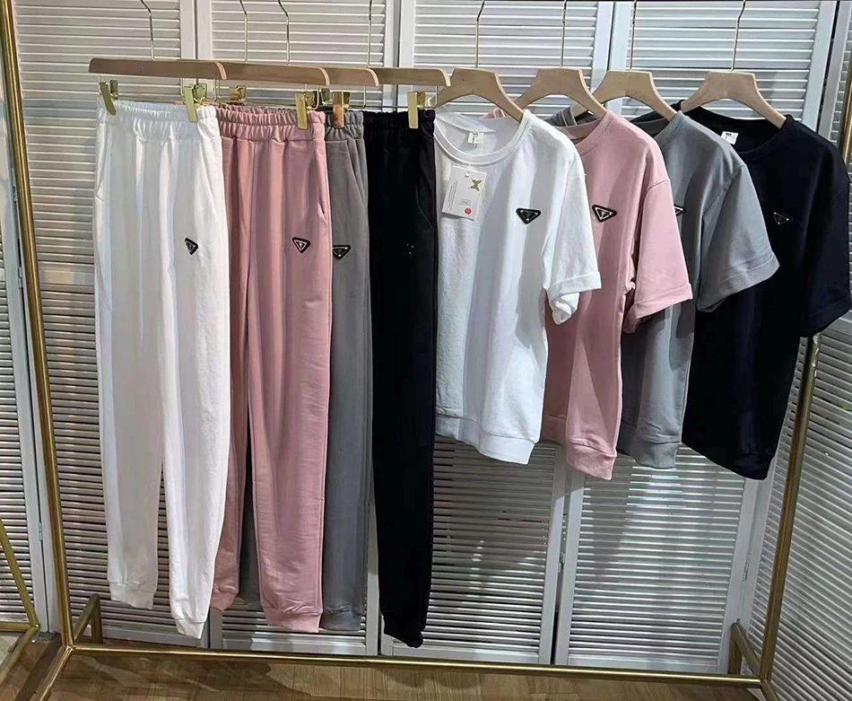 

Free Shipping 2021 Summer New Women's Pure Color Casual Set Round Neck Short Sleeve Pullover T-shirt & Long Pants Two-piece Set