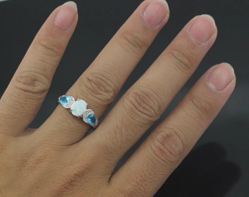 

Hot Sale New Wholesale Retail Prong Setting Blue Stone White Fire Opal Rings for WomenOR850