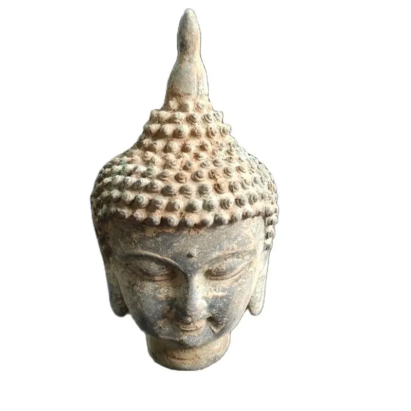 

Antique Buddha head ornaments unearthed from bronze ware